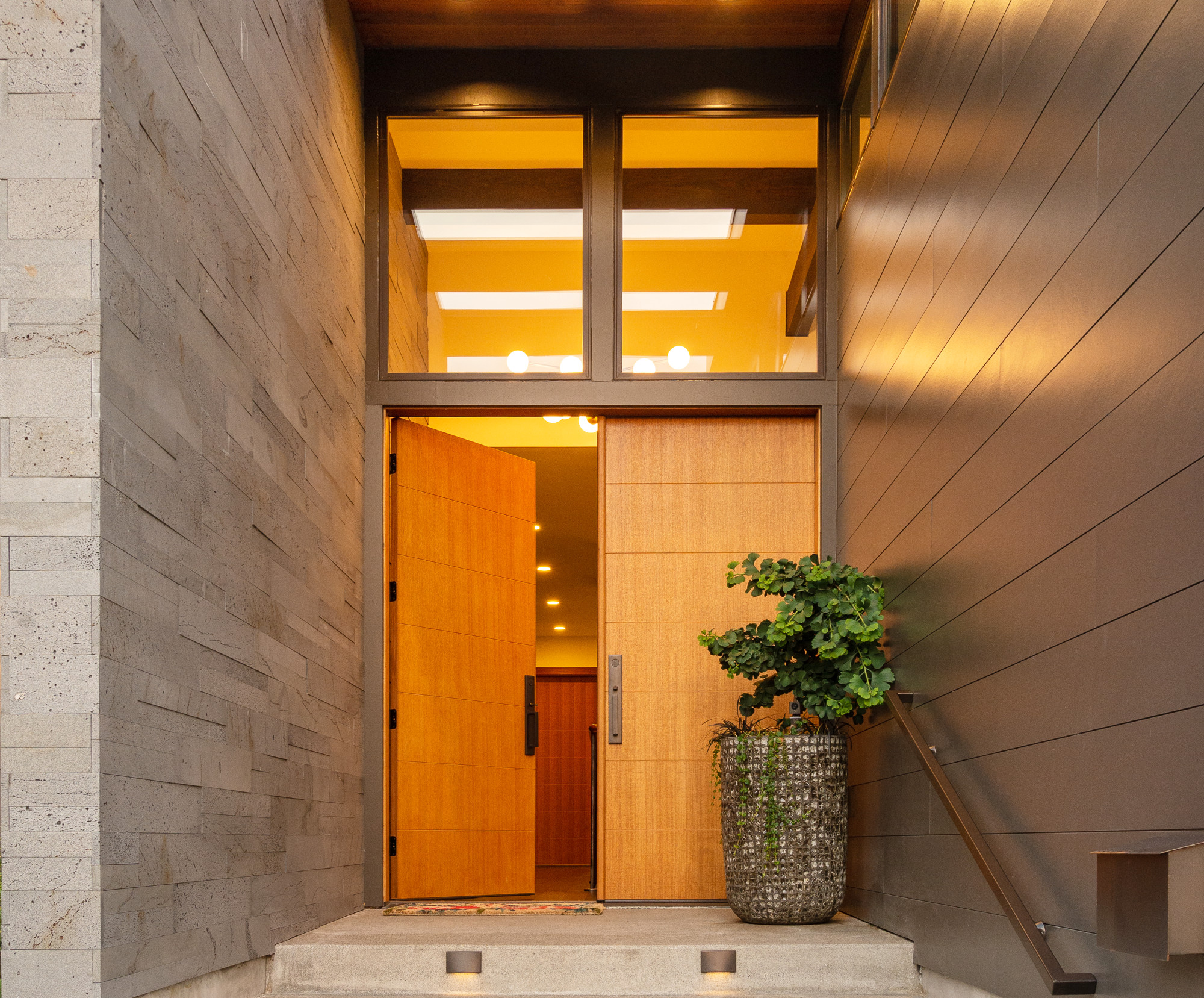 Front entry steps with natural light and step lighting